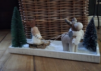 Kerst tafereel slee met rendier